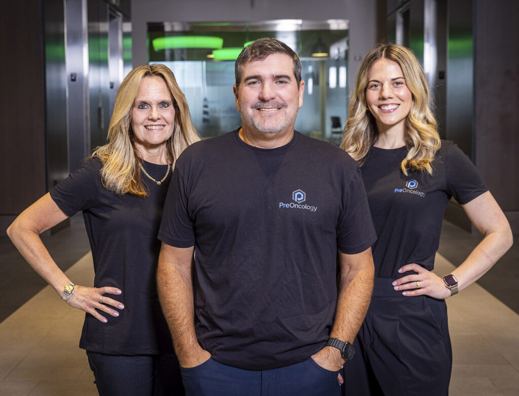 The PreOncology Prevention Care Team standing and smiling at the camera